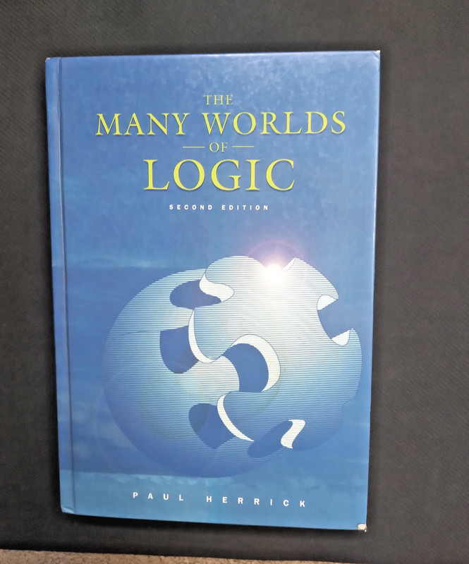 The Many Worlds of Logic 2nd edition – Hardcover By Herrick, Paul 2000 – GOOD