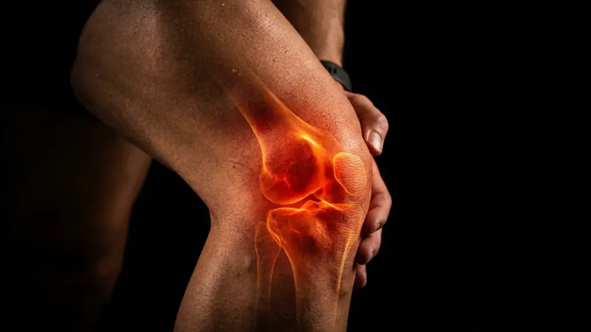 Gebogen hardloopknie met gloeiend oranje pijnpunt bij de knieschijf, symboliseert kniepijn bij hardlopers.