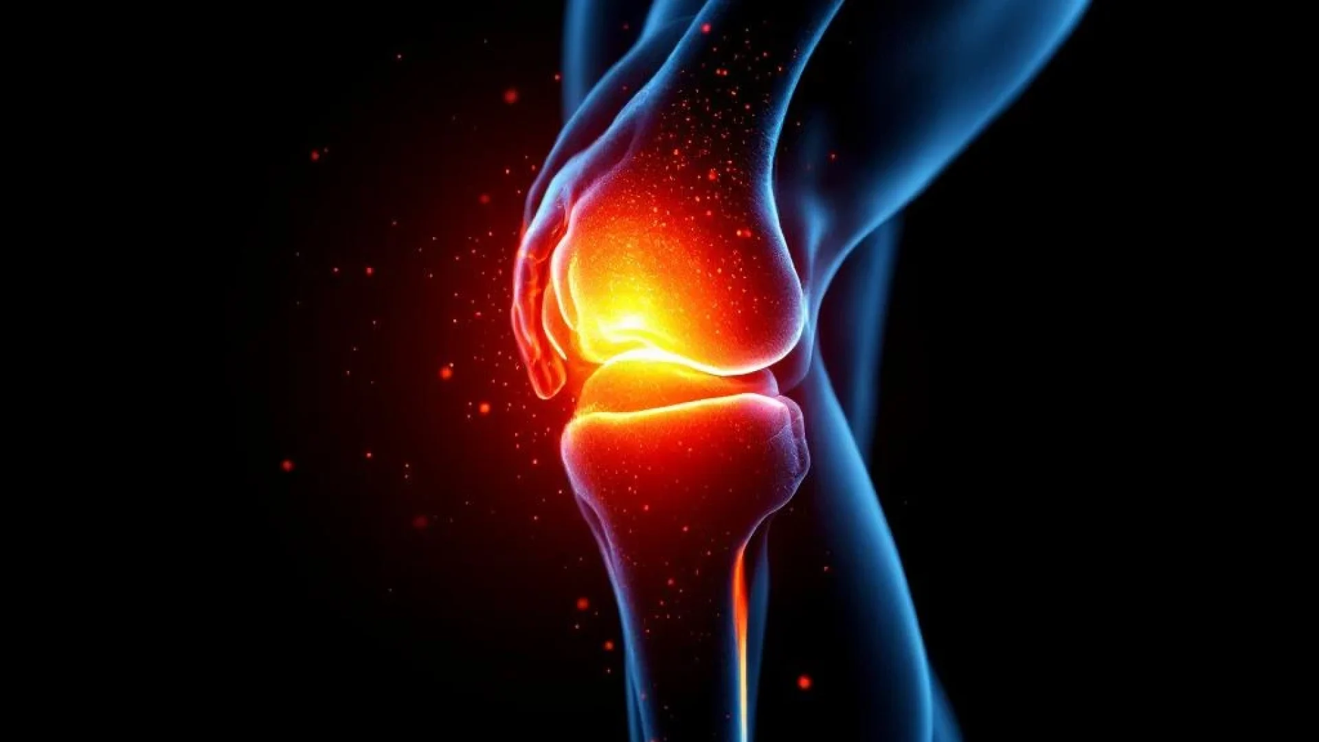 Menselijke knie in profiel met oranje therapeutisch licht dat genezing en pijnverlichting door natuurlijke bewegingstherapie symboliseert