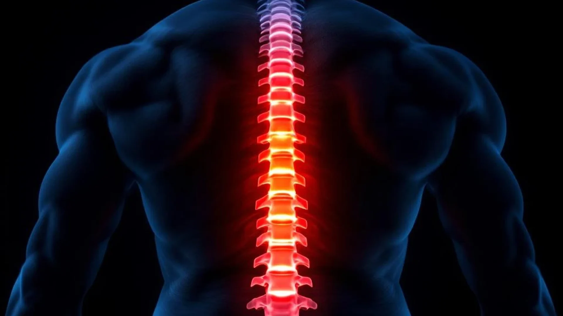 Menselijke onderrug met verlichte lumbale wervelkolom in oranje gloed tegen zwarte achtergrond, fysiotherapie concept